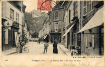 Poligny (Jura). 215. La grande rue et la croix du Dan. Paris, B.F.