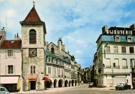 Lons-le-Saunier (Jura). CI.-2. La tour de l'horloge et les arcades. Mâcon "cim", imprimerie Combier.