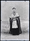 Reproduction du portrait d'un prêtre en tenue d'apparat.