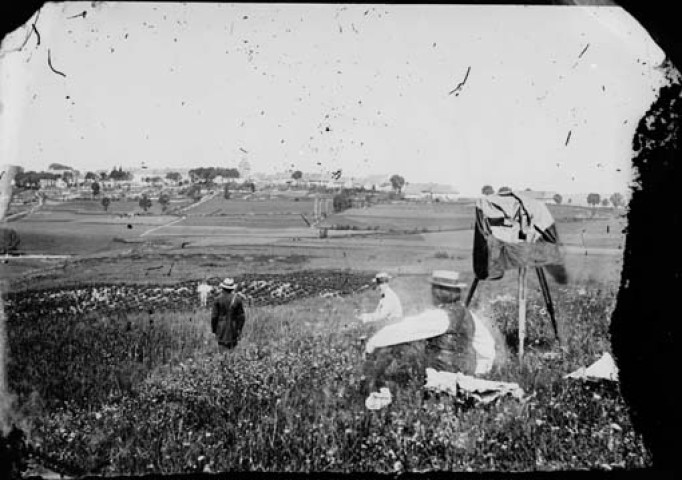 Photographe réalisant une prise de vue de Nozeroy